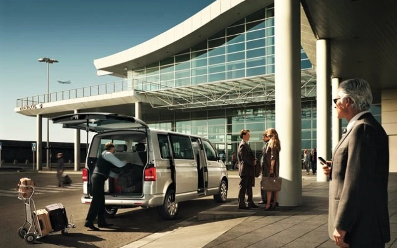 Airport transportation service with a luxury chauffeur-driven vehicle for safe and comfortable transfers.