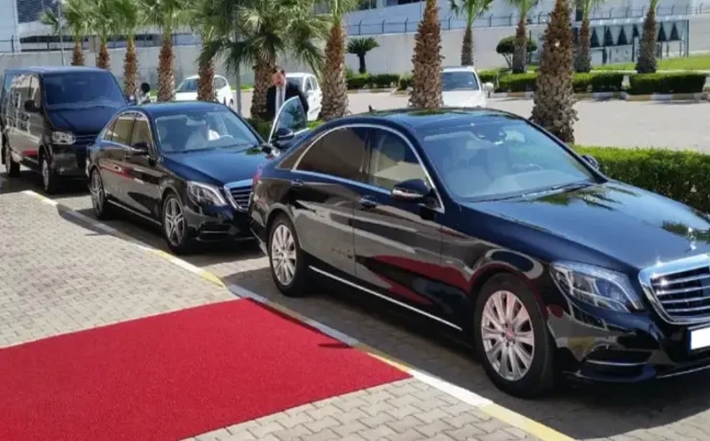 Roadshow car service with a luxury chauffeur-driven vehicle for executive business travel and events.