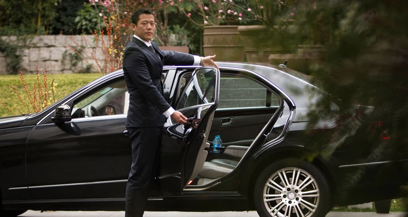 Black Car Service Chicago with a luxury chauffeur-driven vehicle for executive, airport, and private transportation.
